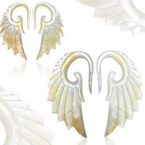  Pair of Hand carved mother of pearl angel wing tapers, 8 