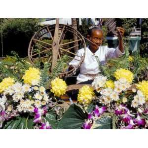  Carder Working on a Bedecked Floral Boat, Flowers Festival 