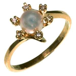   gold 5.4 mm white pearl and 0.06 ct diamond ring. Size 6.5  