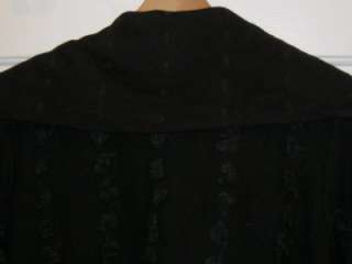 Below the knee black sweater coat, large, with just enough fringe to 