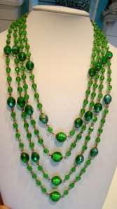   brilliantly faceted green aurora borealis beads, all individually