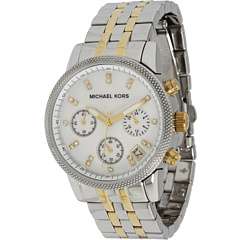   with this classic michael kors watch two tone stainless steel case and