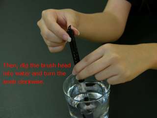 dip the brush head into the water and turn the piston knob clockwise 