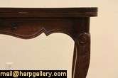   hand carved about 1920 of fine grained oak two pull out leaves extend