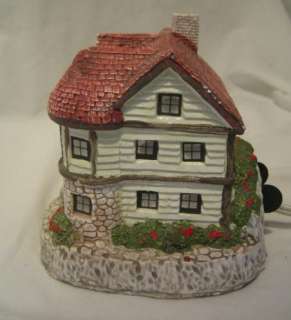 Small ceramic lighted house  