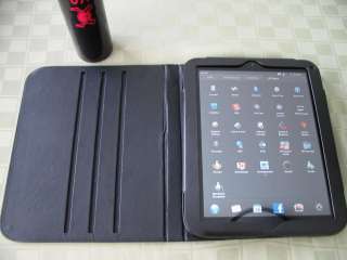 HP TouchPad 32GB, Wi Fi, 9.7in with Leather Case and Carbon Fiber Skin 