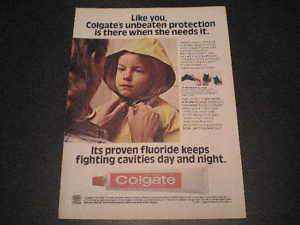 1981 Colgate Toothpaste Ad Little Girl Yellow Rain Coat  